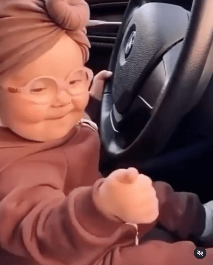 Here is a Baby Fist-Pumping to a Tiësto Track Behind the Wheel of a BMW